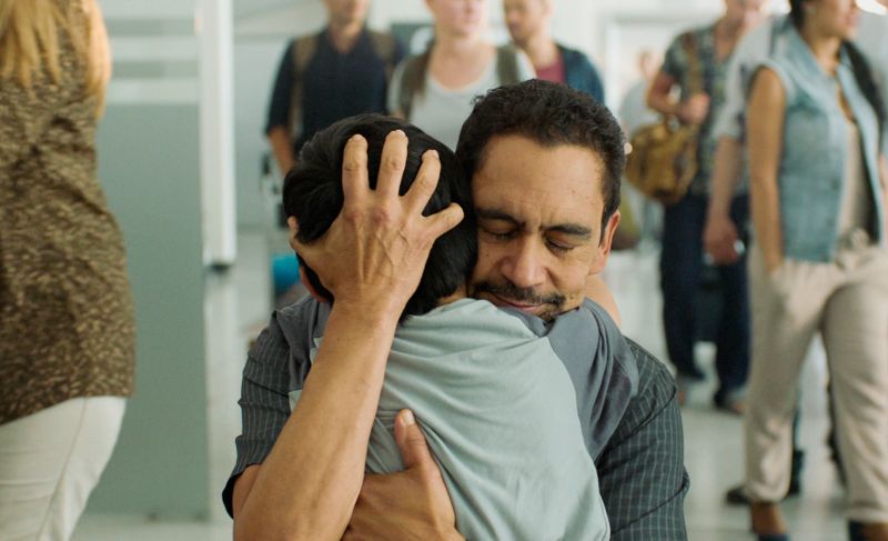 Father and son hugging